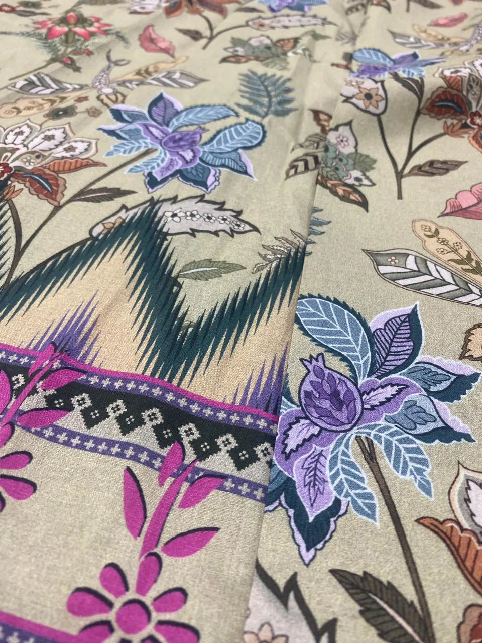 Close-up of premium quality digital print on breathable summer lawn fabric showing intricate design details.