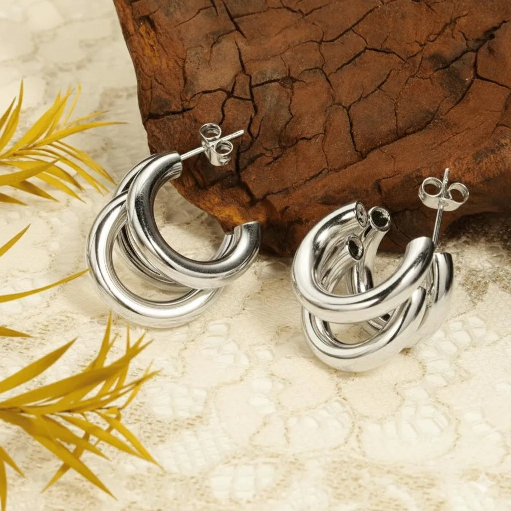 Golden three-layer Korean style hoop earrings for women made of lightweight alloy for casual and festive jewelry wear.