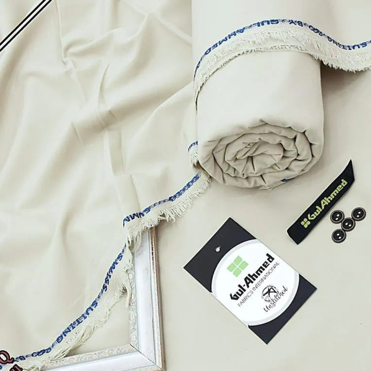 Off-white unstitched wash and wear suit for men with premium wrinkle-free fabric and original brand packaging for formal events.