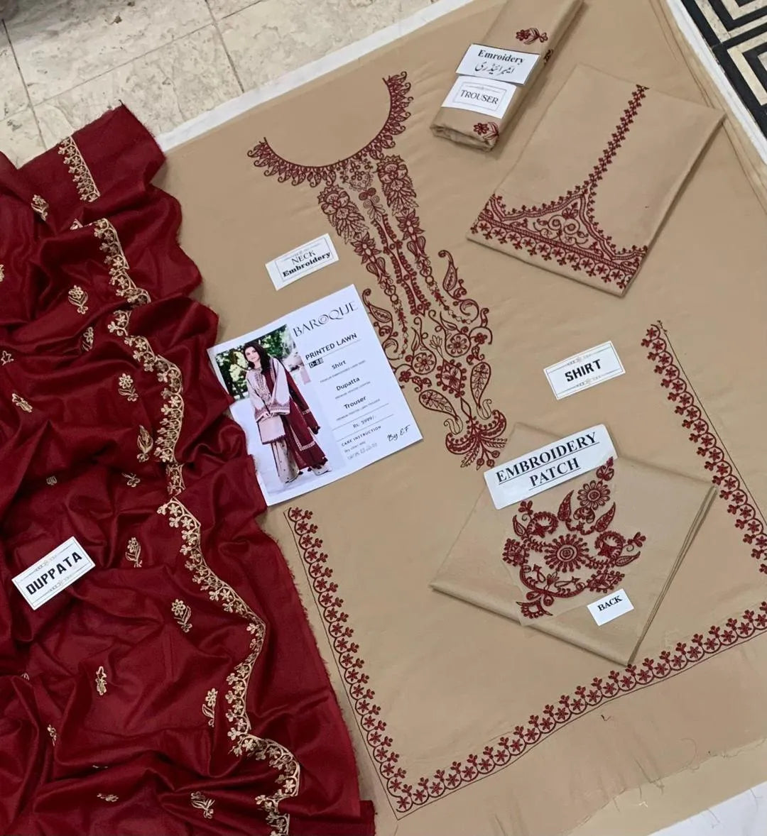 Embroidered ivory maroon 3-piece lawn suit for women with digital print diamond fabric dupatta for wedding party wear.