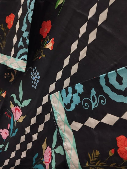Black digital printed Pakistani kurta set for women in Swiss lawn fabric with embroidered shirt and matching trouser.