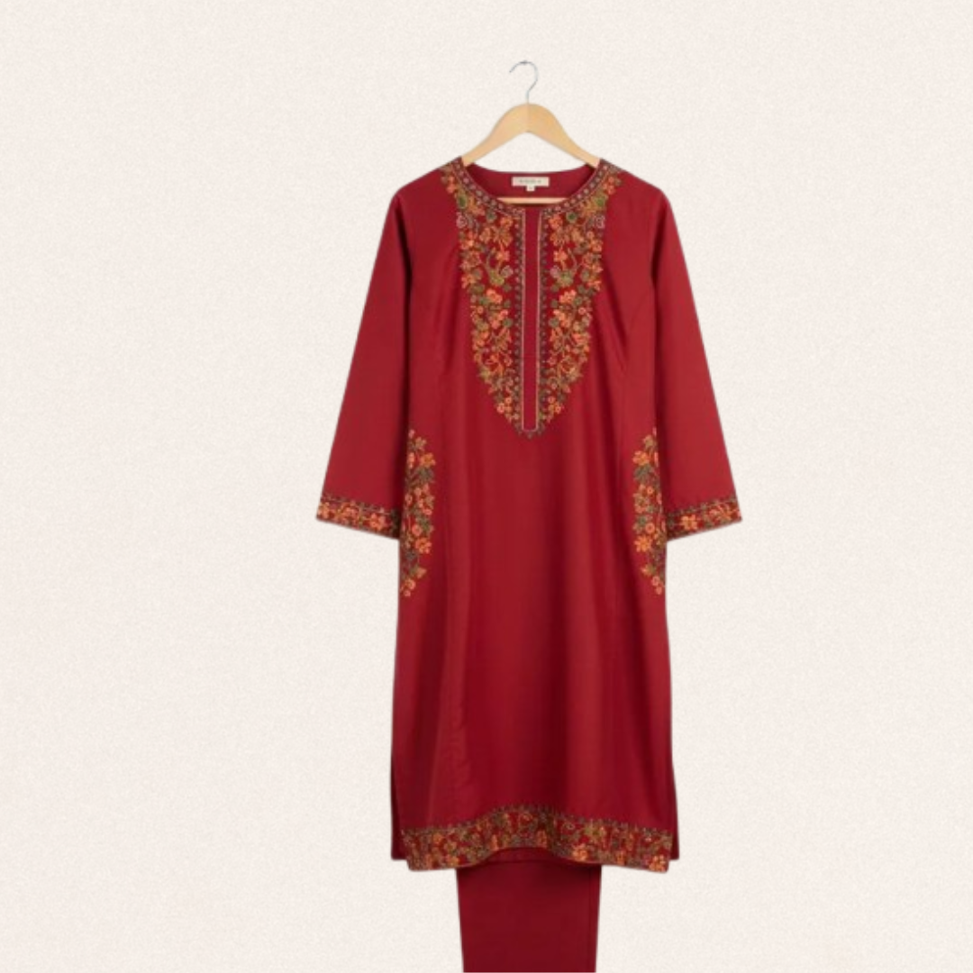 Elegant maroon stitched linen set with unique collar neckline and contrasting embroidery on sleeves and pocket.