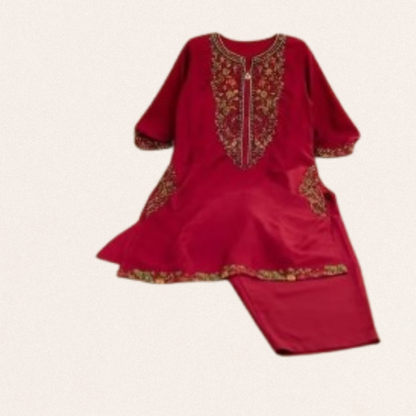 Elegant maroon stitched linen set with unique collar neckline and contrasting embroidery on sleeves and pocket.