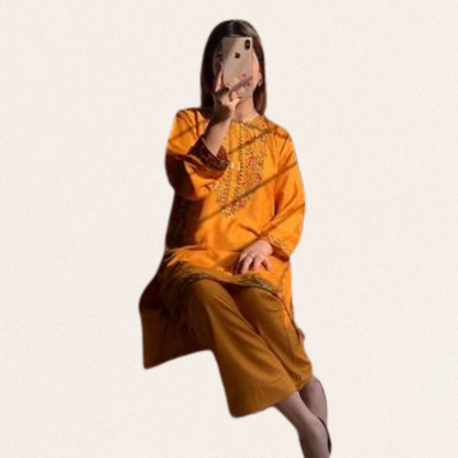 Vibrant yellow 2-piece linen ensemble with traditional embroidery, ideal for festive events and summer outings.