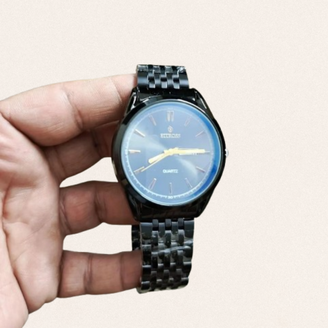 Men's silver steel chain strap watch with working day and date display and round dial for formal business styling.
