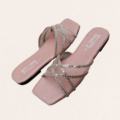 Pink satin fancy flats for women with sparkling rhinestone straps and non-slip sole for festive wedding wear.